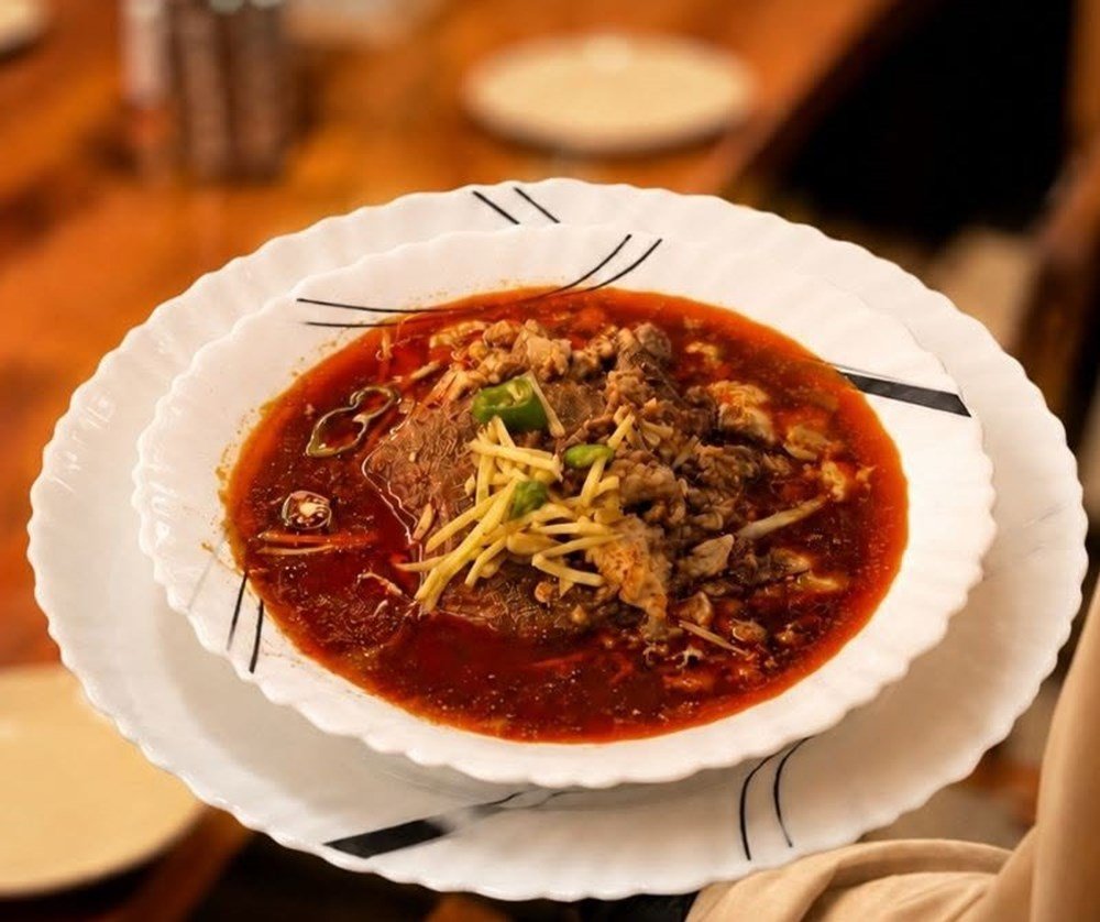 A plate of Zahid's slow-cooked beef nihari served hot